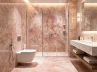 Dalles de marbre rose quartz de luxe pour revêtements de sol, murs d'accent rétroéclairés, îlots cascade et lavabos sculpturaux à veinage apparent