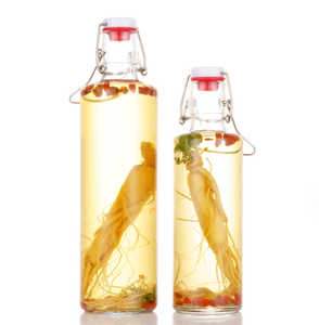 Bouteille en verre transparent de 1000ml avec <span class=keywords><strong>bouchon</strong></span> en céramique et couvercle à clip pivotant 32oz Verre à jus de vin Bouteille d'eau en verre de 600ml pour usage alimentaire - Product Image 4