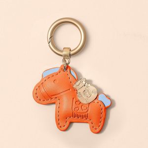 Porte-clés en métal personnalisé avec breloques, accessoire créatif pour sac à main, porte-clés de voiture avec pendentif en cuir, grand succès à venir - Product Image 1