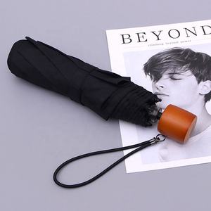 Parapluie compact de 23 pouces, portable, résistant, en tissu pongé 190T, imperméable, coupe-vent, ouverture manuelle, pliable en 3 sections, avec poignée en bois - Product Image 1