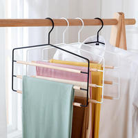 Cintre à pantalons multi-niveaux en métal et fer avec barres rondes en bois pour armoire et séchage du linge