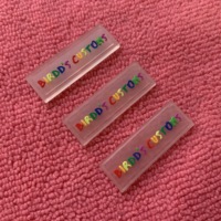 Étiquette en caoutchouc transparente avec logo en relief, étiquettes en caoutchouc de silicone écologiques avec lignes de couture