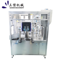 Machine automatique de remplissage et de bouchage de sachets à double bec verseur pour liquides, pâtes, cosmétiques, lotions et savons