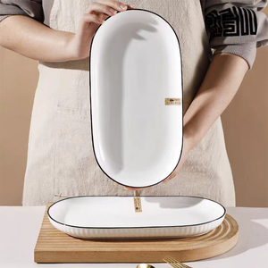 Assiette ovale de <span class=keywords><strong>poisson</strong></span> à double oreille en céramique blanc pur créatif de haut niveau d'apparence vaisselle - Product Image 2