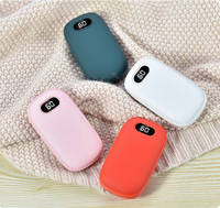 2026 Vente en gros usine Chauffe-mains Power Bank rechargeable USB avec affichage numérique de la température 6000 mAh