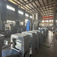 6700 PCS/H Upscaling Food Machine Taco Ligne de production Cuisson Refroidissement Empilage Pressage Stratification Sûr et Sain