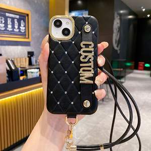 Funda de teléfono personalizada <span class=keywords><strong>con</strong></span> <span class=keywords><strong>nombre</strong></span> personalizado para <span class=keywords><strong>iPhone</strong></span> 16 15 Pro Max, funda protectora de diamantes de cuero PU de lujo <span class=keywords><strong>con</strong></span> cordón de pulsera - Product Image 5