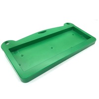 Base de boîtier en plastique UHMWPE vert usiné CNC avec cavité encastrée et trous de fixation multiples pour outil de manutention