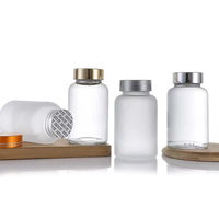 Vente en gros bouteille en verre mat de pilules 1oz 2oz 4oz 120ml 250ml bocaux de stockage de médicaments en capsule givrée transparente bouteilles de vitamines