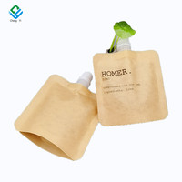 Pochettes souples vides OEM en plastique pour soins de la peau, avec bec verseur, en papier kraft, à fond plat, pour liquides cosmétiques