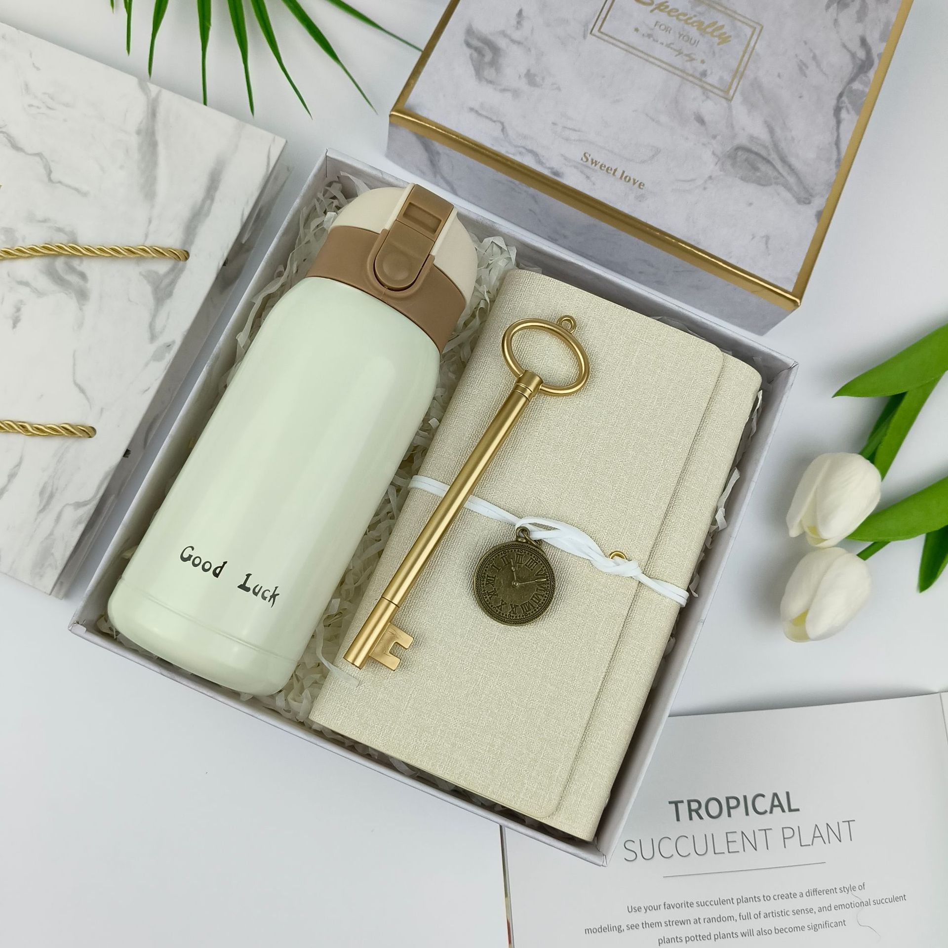 Vacuum flask + Notebook + Key pen
