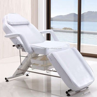Lit de beauté moderne en cuir synthétique avec cadre métallique, dossier et pieds réglables pour usage commercial dans les hôtels et salons de beauté