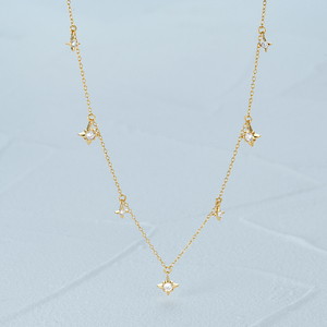 สร้อยคอ CANNER Jewelry สไตล์มินิมอล เงินแท้ 925 ประดับเพชร CZ รูปดาว ดีไซน์สวยหรู พร้อมจี้ดาวเคลือบทอง 18k สำหรับผู้หญิง - Product Image 5