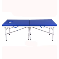 La table de massage pliable portable avec six pieds est plus stable et plus porteuse