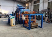 Machine à fabriquer des briques emboîtables QT4-15, machine à fabriquer des blocs entièrement automatique, machine à briques à haut rendement pour le Ghana et le Cameroun