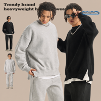 Sweat-shirt col rond en molleton brossé pour homme, coupe ample, ourlet fendu sur le côté, couleur unie, style streetwear décontracté, vente en gros