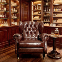 Fauteuil Chesterfield classique en cuir véritable marron capitonné avec dossier haut pour bar à domicile et salon de cigares