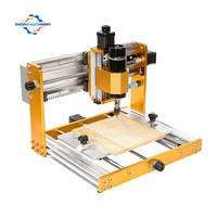 Équipement de découpe, de perçage et de gravure sur bois de haute précision, machine à graver le bois pour la décoration de meubles