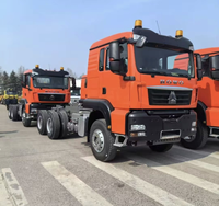 Nouveau châssis de camion robuste orange et blanc 6x4 avec roues arrière doubles, capacité de charge élevée de 28 tonnes, train d'atterrissage pour remorque de voiture