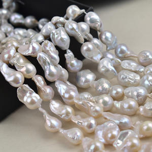 ไข่มุกน้ำจืดธรรมชาติ ยาว 40 ซม. สำหรับงาน DIY รูปทรงหางปลา ขนาดใหญ่ สีสันสดใส ประกายเงางาม รูปทรงไม่สม่ำเสมอ ไข่มุกแบบร้อยเส้น - Product Image 1