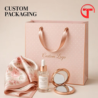 Sacs cadeaux de luxe en papier avec poignées, logo personnalisé pour les emballages de produits cosmétiques en détail