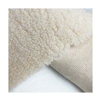Sortie personnalisée 100% polyester tricoté tissu doux fausse fourrure pour vêtements matelas rembourrage Sherpa polaire manteau motif Design