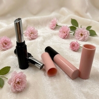 Tube de rouge à lèvres en plastique noir et rose avec ouverture et fermeture rotatives, tube de baume à lèvres, emballage cosmétique, contenant de rouge à lèvres