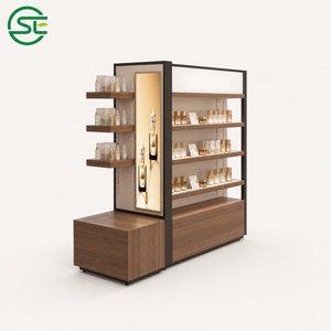 Expositor de Cosméticos Personalizado Tipo Isla, Góndola de Exhibición de Maquillaje para Minoristas, Estantería de Exhibición para Tiendas de Belleza con Marco Metálico e Iluminación LED - Product Image 3