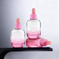 Vente en gros de flacons en verre ronds bleus dégradés de 50 ml - Contenant vide pour huile essentielle avec logo personnalisé et compte-gouttes en caoutchouc