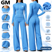Ensemble de fitness GM en gros : Haut zippé et pantalon évasé taille haute sculptant les fessiers, ensemble de yoga décontracté premium