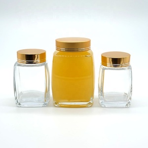 50ml 100mL 180ml 280ml 360ml 750ml Botella de miel de vidrio de forma cuadrada única Proveedor de tarros con tapa dorada utilizada para mermelada de pudín de miel - Product Image 5