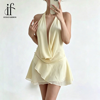 Robe d'été personnalisée en gros pour femme, noire unie en viscose, col licou, décolleté plongeant en V, sans manches, ourlet à volants, mini-robe