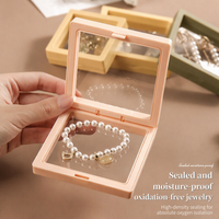 Boîte de présentation flottante en film PE anti-poussière avec fermeture robuste, étui de voyage anti-ternissement pour bijoux, disponible en plusieurs tailles pour la vente au détail
