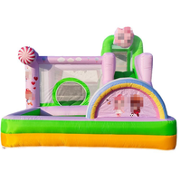 Château gonflable avec toboggan et piscine à balles, motifs de dessins animés colorés pour les fêtes d'enfants en plein air, aire de jeux, centre d'amusement