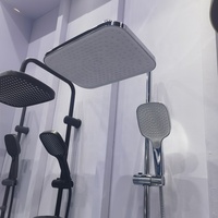 Colonne de douche noire de qualité supérieure en acier inoxydable surpuissante avec douchette séparée et jet pluie pour hôtels