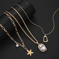 Nouveau collier à pendentif en forme d'étoile de mer et de coquillage en fausse perle océanique irrégulière, 3 pièces, pour femmes, bijoux superposés exquis, accessoires de mode