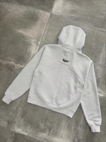 Ensemble de survêtement pour homme en molleton de coton gris chiné, comprenant un sweat à capuche oversize à fermeture éclair intégrale avec panneaux à coutures courbées et un pantalon de jogging coupe ballon