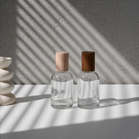 Flacon de parfum élégant de 50ml avec pulvérisateur et bouchon en bambou Récipients de maquillage Flacon de parfum rond en verre