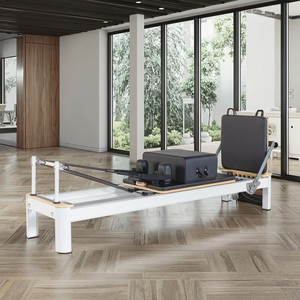 Equipo de Estudio Comercial de Alta Calidad, Reformer de Aluminio Blanco y Negro para Pilates - Product Image 1