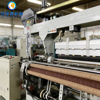 Machine à tisser à rapier à large application pour le coton, le lin, la laine et les fibres chimiques JDX