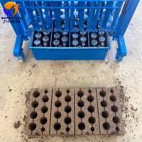 Machine manuelle portable WJ 4-45 pour la fabrication de briques en ciment, machine à blocs économe en énergie pour les projets de construction à faible coût et les bâtiments ruraux