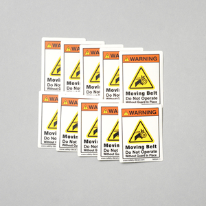 ADVERTENCIA: La cinta transportadora puede triturar. No operar sin protector en su lugar. Etiquetas de embalaje de policarbonato impermeables con adhesivo 3M M05 - Product Image 6