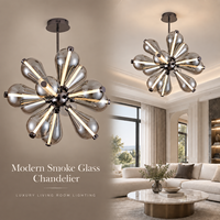 Lustre moderne de luxe avec globes en verre fumé en forme de goutte, bras rayonnants, moyeu en métal noir, sculpture lumineuse LED chaude, design élégant