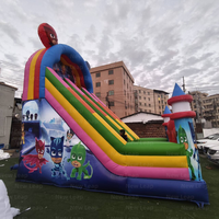 Château gonflable Yuedong avec toboggan, aire de jeux, parc de dessins animés, double piste d'escalade et toboggan sec