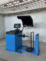 Équilibreuse de roues automatique pour camions avec auto-calibrage, mesure laser haute précision, machine robuste pour l'équilibrage des pneus de camions lourds