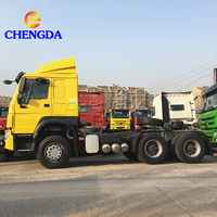 Tracteur d'occasion Sino Howo de 40 tonnes 375hp diesel camions à cheval remorque tête camion utilisé camion à vendre