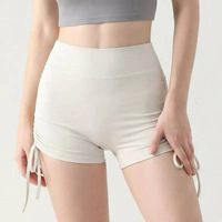 Shorts de yoga best-sellers pour femme, effet ventre plat, en Spandex/Nylon, motif uni, sans coutures apparentes, design ultra-confortable, avec cordon de serrage