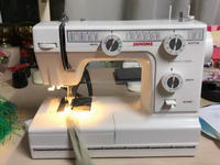 Machine à coudre compacte Janome L-392 à point de recouvrement, contrôlée par ordinateur, avec 22 motifs de points, pour la couture à domicile, en vente