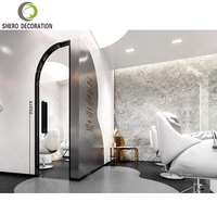 Meubles de salon de beauté haut de gamme, éclairage LED, logo, comptoir d'accueil, design de salon de coiffure, vitrine, salon de barbier