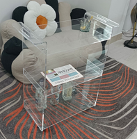 Table basse moderne en acrylique avec roulettes, utilisée à l'hôtel et à la maison